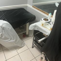 Pooja Threading & Wax Beauty Spa - The wax she used without changing out the sticks. She is using this on everyone. Disgusting