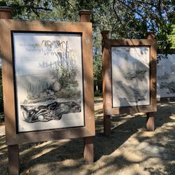 Seeley Lake Park - Welcome signs, including information about the watershed.