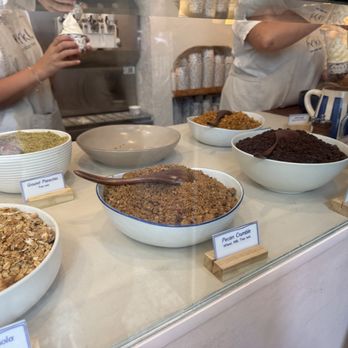 Myka - Ground Pistachio (Left rear) and Granola and Pecan Crumble toppings - Ice Cream & Frozen Yogurt Near Me - New York, New York Myka - Ground Pistachio (Left rear) and Granola and Pecan Crumble toppings - Ice Cream & Frozen Yogurt Near Me - New York, New York