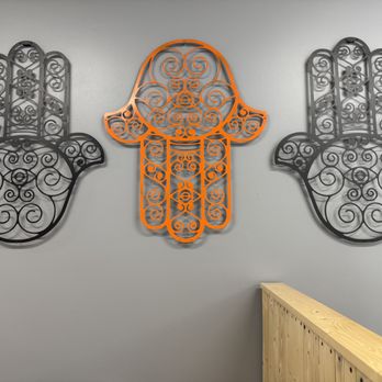 Oh Mama Grill - Hamsas galore! (This lets me know I'm home.) This wall art bridges the gap between traditional and ultra-modern .... - Mediterranean Near Me - Rockville, Maryland