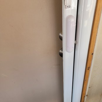 Apollo Screen & Shade - Handle is on the wrong side - difficult to reach the door knob, impossible to lock the door - Shades & Blinds Near Me - Henderson, Nevada