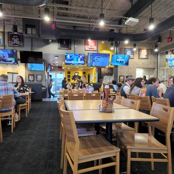 Buffalo Wild Wings - Front entrance and seating que. - Chicken Wings Near Me - Tulsa, Oklahoma Buffalo Wild Wings - Front entrance and seating que. - Chicken Wings Near Me - Tulsa, Oklahoma