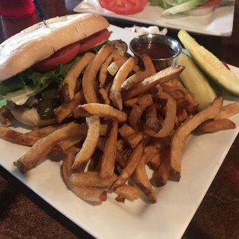 Henry's Northeast - The Carolina Chicken Cheesesteak with lettuce, tomato, and side of fries - American Near Me - Columbia, South Carolina Henry's Northeast - The Carolina Chicken Cheesesteak with lettuce, tomato, and side of fries - American Near Me - Columbia, South Carolina