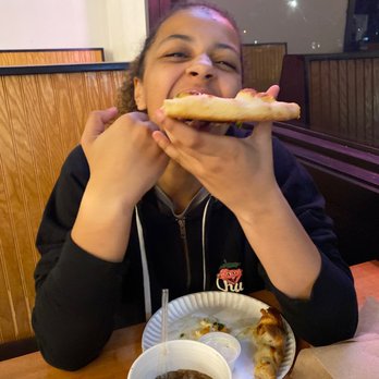 Papa V Pizza - My kid loving her dinner - Italian Near Me - Lubbock, Texas Papa V Pizza - My kid loving her dinner - Italian Near Me - Lubbock, Texas