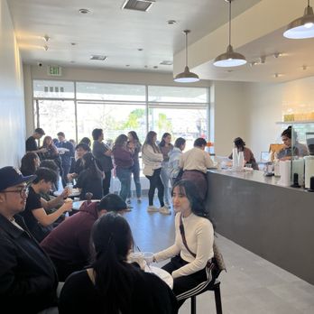 Re Coffee - Inside view of tables and the line going out the door - Desserts Near Me - Northridge, California Re Coffee - Inside view of tables and the line going out the door - Desserts Near Me - Northridge, California