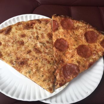 Joe's Famous Pizza - Two slices, at Joe's Famous Pizza in Vauxhall, NJ. - Pizza Near Me - Vauxhall, New Jersey