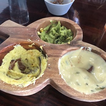 El Patio - Dip trio! Queso, guacamole and a super yummy corn dip. - Mexican Near Me - Hollister, Missouri El Patio - Dip trio! Queso, guacamole and a super yummy corn dip. - Mexican Near Me - Hollister, Missouri