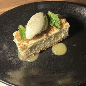El Che Steakhouse & Bar - Cheesecake  Pineapple Gel, Graham Cracker Streusel, Whipped Cream - Argentine Near Me - Chicago, Illinois