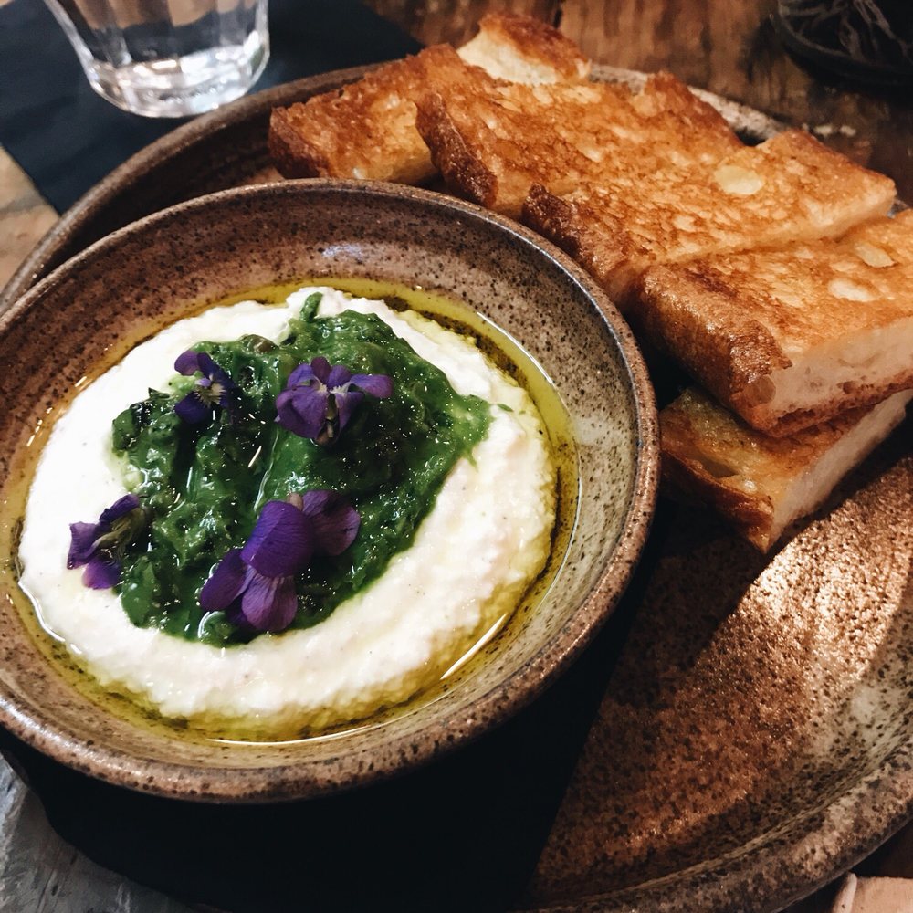 Foraged. A Hyper Seasonal Eatery - Garlic, currant, candied lemon, and ricotta spread with crispy baguette. Divine. - New American Near Me - Baltimore, Maryland