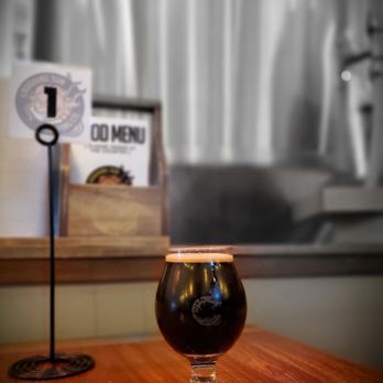Laughing Sun Brewing - a glass of beer on a table - Music Venues Near Me - Bismarck, North Dakota Laughing Sun Brewing - a glass of beer on a table - Music Venues Near Me - Bismarck, North Dakota
