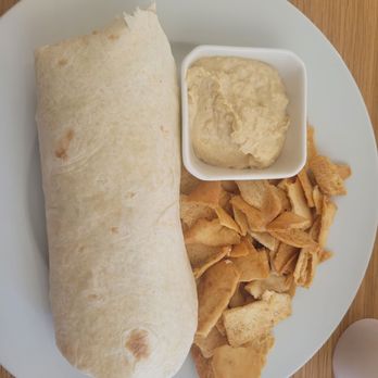 Alabaster Coffee - Grilled chicken Caesar wrap with hummus and pita chips - Coffee & Tea Near Me - Scottsboro, Alabama