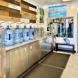 Alka Waterhouse - Filling up our four, 5-gallon water bottles all at the same time.