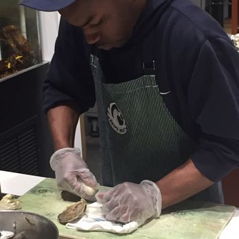 Red's Best - Shucking some fresh, delicious oysters! - Seafood Near Me - Boston, Massachusetts