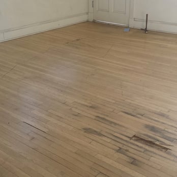 Floor Maintenance Service - Before, The floor had some very damaged pieces that they were able to replace. - Flooring Near Me - Los Angeles, California