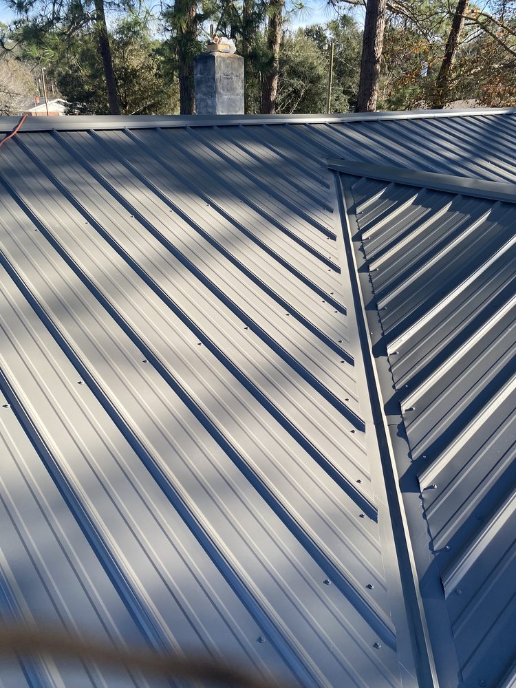 Slide of American Top Gun Roofing