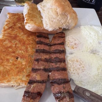 Cowboy Cafe - Elk Sausage, hash brown potatoes,  biscuit and eggs - American Near Me - Dubois, Wyoming