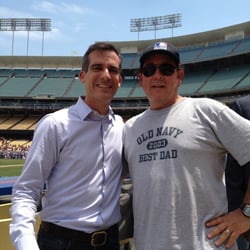 Valley Village Chiropractic - Los Angeles Mayor Eric Garcetti & Dr. K enjoying the 2013 High School Championship game at Dodger Stadium. SF 2, Clev. 1