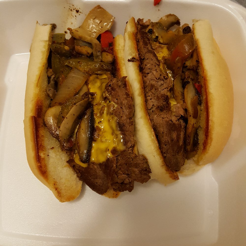 two subs in a styrofoam container two subs in a styrofoam container