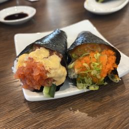 Spicy tuna and salmon truffle hand roll