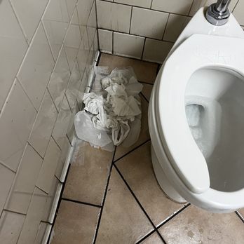 Ralphs - Wet clump of toilet paper just left of the floor - Grocery Near Me - Los Angeles, California