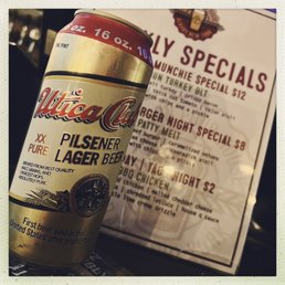a can of beer on a table