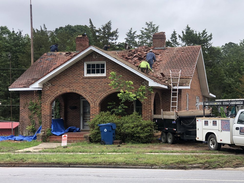 Slide of Ray's Roofing & Restoration