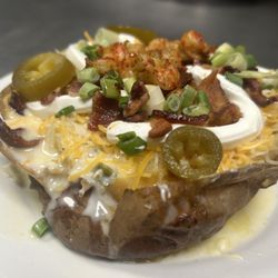 Buffalo Bell - Crawfish and queso loaded baked potato