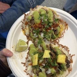 Birria(top) an Tijuana style pastor(bottom) tacos Birria(top) an Tijuana style pastor(bottom) tacos