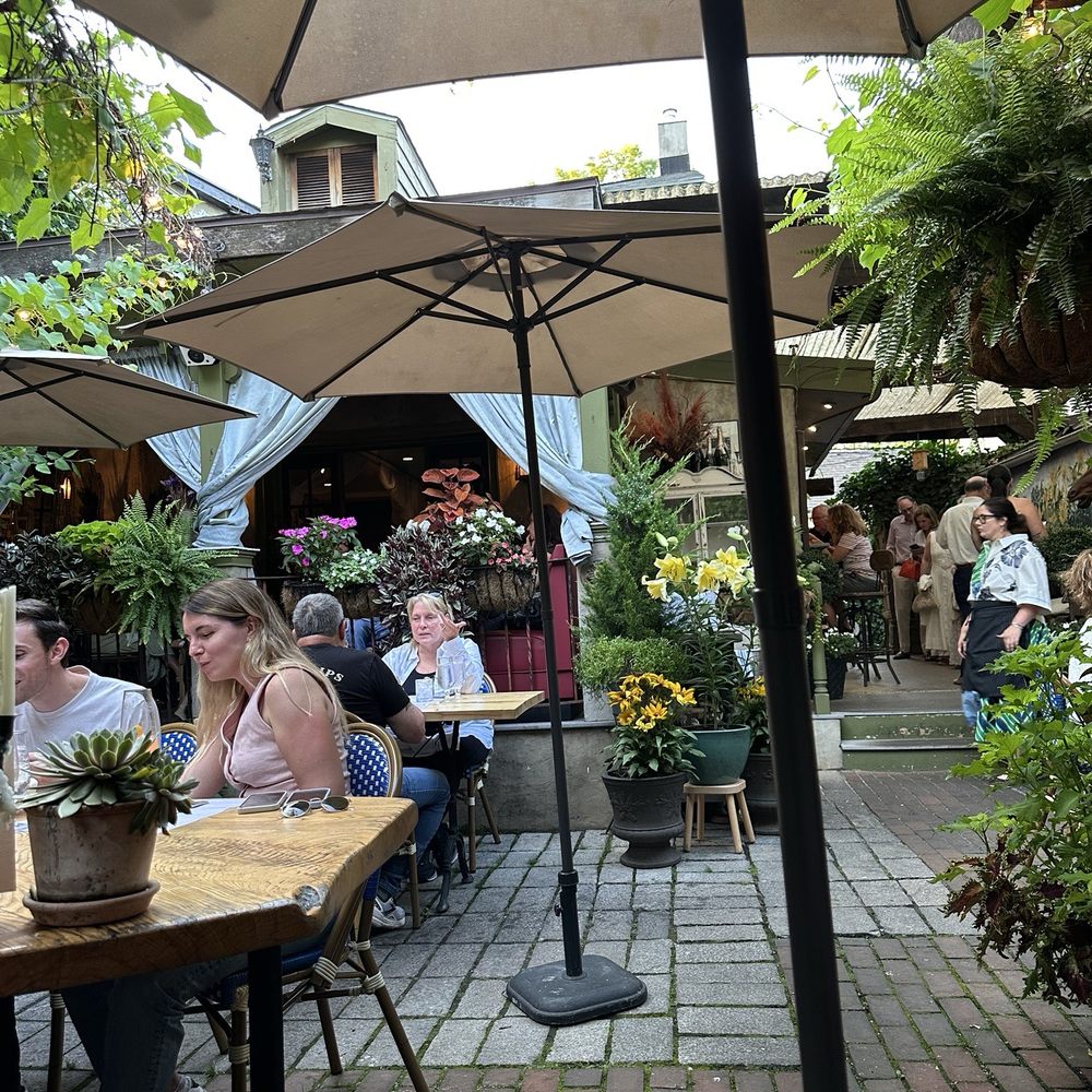 Zoubi - View of courtyard seating. So lush and green. Beautiful flowers throughout. - New American Near Me - New Hope, Pennsylvania Zoubi - View of courtyard seating. So lush and green. Beautiful flowers throughout. - New American Near Me - New Hope, Pennsylvania