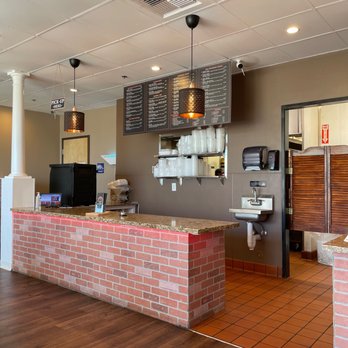 Tandoori Flame - a brick counter in a restaurant - Indian Near Me - Roseville, California Tandoori Flame - a brick counter in a restaurant - Indian Near Me - Roseville, California