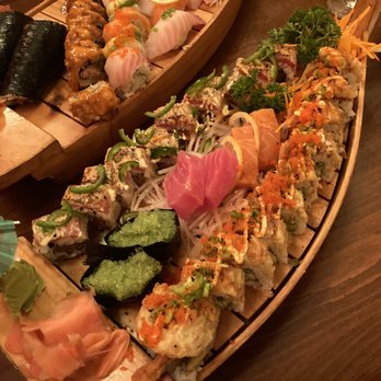 Ta-Ke Sushi and Grill - Our sushi boats. I think they put all of their sushi on a boat instead of a plate. Hubs ordered actual boat and I ordered 2 rolls - Sushi Bars Near Me - Orlando, Florida Ta-Ke Sushi and Grill - Our sushi boats. I think they put all of their sushi on a boat instead of a plate. Hubs ordered actual boat and I ordered 2 rolls - Sushi Bars Near Me - Orlando, Florida