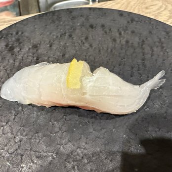 Kuramoto - nigiri course - seabream w yuzu skin on top - Sushi Bars Near Me - Tustin, California