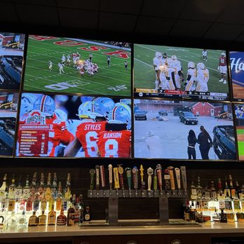 Wings and Rings - The 8 TVs over the bar, three on the same cop show - New American Near Me - Fort Myers, Florida Wings and Rings - The 8 TVs over the bar, three on the same cop show - New American Near Me - Fort Myers, Florida