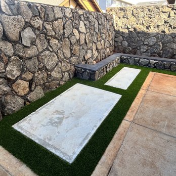 Agape Outdoor Works - Back corner of house - Landscaping Near Me