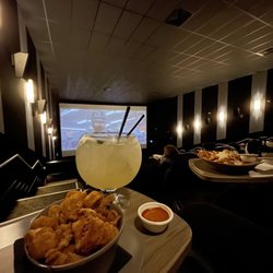 Cineplex VIP Cinemas - Calamari with a margarita fish bowl.