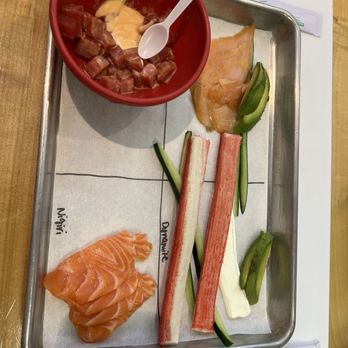 Well Done Cooking Classes - These were ingredients for each roll and sushi we made. - Cooking Classes Near Me - Houston, Texas