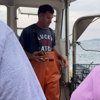 Lucky Catch Cruises - Tossing caught crabs back - Boat Charters Near Me - Portland, Maine