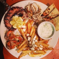 Greek Island Grill - Grilled seafood platter with Greek fries