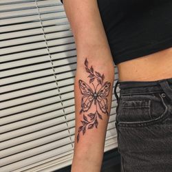 Njoy Ink Studios - Butterfly tattoo, black and grey, floral leaves arm tattoo