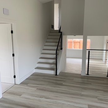 Dedicated Construction Services - up the stairs to the other 4 bedrooms. Used to be very dark - General Contractors Near Me
