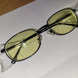 LensCrafters - I purchased a pair of work safety glasses with a yellow tint for my light sensitivity.  Love them.