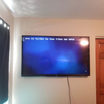 Jason's Tech Solutions - Tv mounted on bedroom wall. - IT Services & Computer Repair Near Me Jason's Tech Solutions - Tv mounted on bedroom wall. - IT Services & Computer Repair Near Me