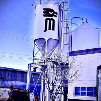 Marble Brewery - a tree in front of the building - Breweries Near Me - Albuquerque, New Mexico