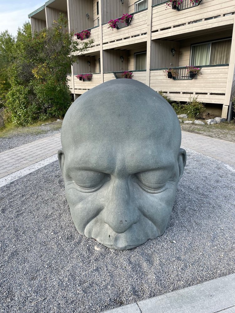 THE CAEN MORE BIG HEAD SCULPTURE Updated September 2024 701 6 Avenue, Canmore, Alberta