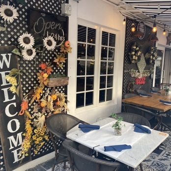 The Tavern - Outside seating area decor. - Breakfast & Brunch Near Me - Miami Beach, Florida The Tavern - Outside seating area decor. - Breakfast & Brunch Near Me - Miami Beach, Florida