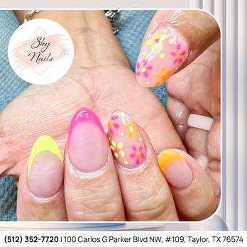 Sky Nails - Bright, bold, and blooming! Add a pop of color to your day with these vibrant floral nails. Perfect for those who love to stand out! - Nail Salons Near Me - Taylor, Texas Sky Nails - Bright, bold, and blooming! Add a pop of color to your day with these vibrant floral nails. Perfect for those who love to stand out! - Nail Salons Near Me - Taylor, Texas