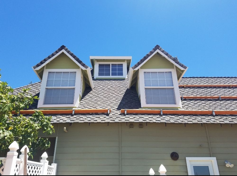 Slide of Harbert Roofing