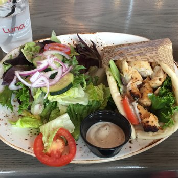 Luna Grill El Camino Real - Grilled chicken wrap ($9.50) - Mediterranean Near Me - Carlsbad, California Luna Grill El Camino Real - Grilled chicken wrap ($9.50) - Mediterranean Near Me - Carlsbad, California