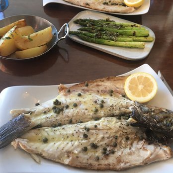 Ouzo Bay - Bronzino, grilled asparagus and potatoes - Greek Near Me - Baltimore, Maryland Ouzo Bay - Bronzino, grilled asparagus and potatoes - Greek Near Me - Baltimore, Maryland