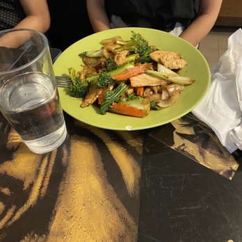 Rising Sons Deli - a plate of food and a glass of water - Thai Near Me - Madison, Wisconsin